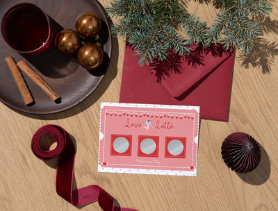 Date night essentials with Love Lotto cards, wine glasses, and cozy lighting to set the mood.