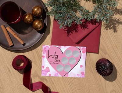 Intimate card game for couples with creative date night prompts and seductive challenges under each scratch square