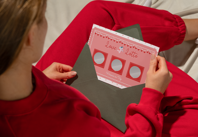 Intimate scratch-off card for couples offering flirty and romantic dares to spice up relationships.