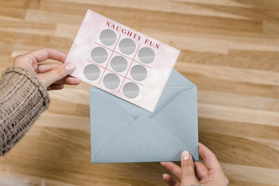Romantic scratch card game for couples featuring fun and sexy challenges for date night or anniversary gift