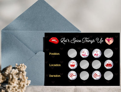 Flat lay of adult scratch card game for couples with seductive packaging and flirty challenge cards